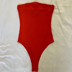 Red body suit